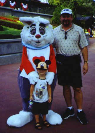 With Dad and the rabbit from Alice in Wonderland