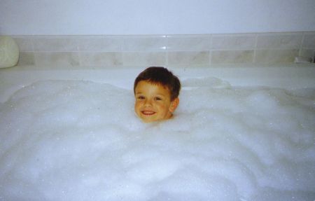 Taking a big bubble bath at Den & Pop's